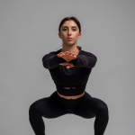 Woman doing squat - front view